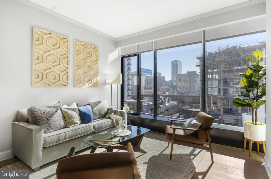 30 North 23rd Street Philadelphia, PA 19103 - Photo 15 of 26 a living room with furniture and a floor to ceiling window