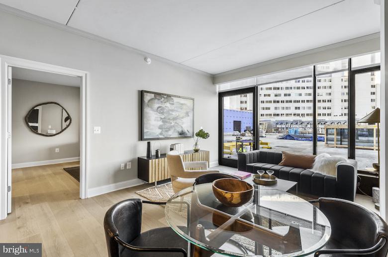 30 North 23rd Street Philadelphia, PA 19103 - Photo 16 of 26 a living room with furniture and a floor to ceiling window