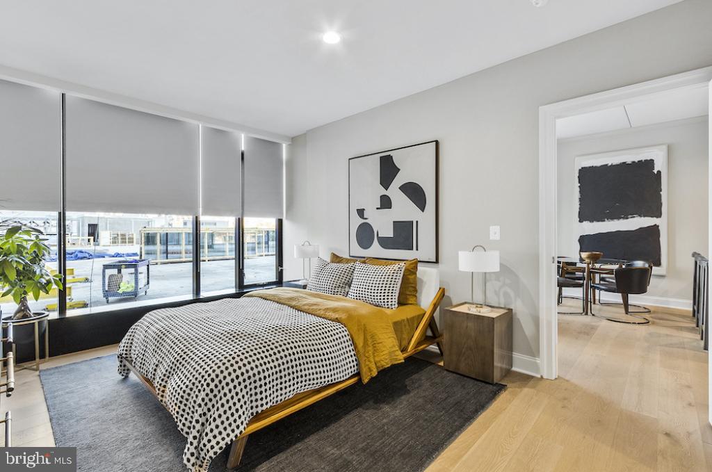 30 North 23rd Street Philadelphia, PA 19103 - Photo 19 of 26 a bedroom with a large bed and a large window