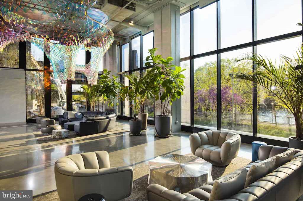 30 North 23rd Street Philadelphia, PA 19103 - Photo 7 of 26 a living room with furniture and a large window