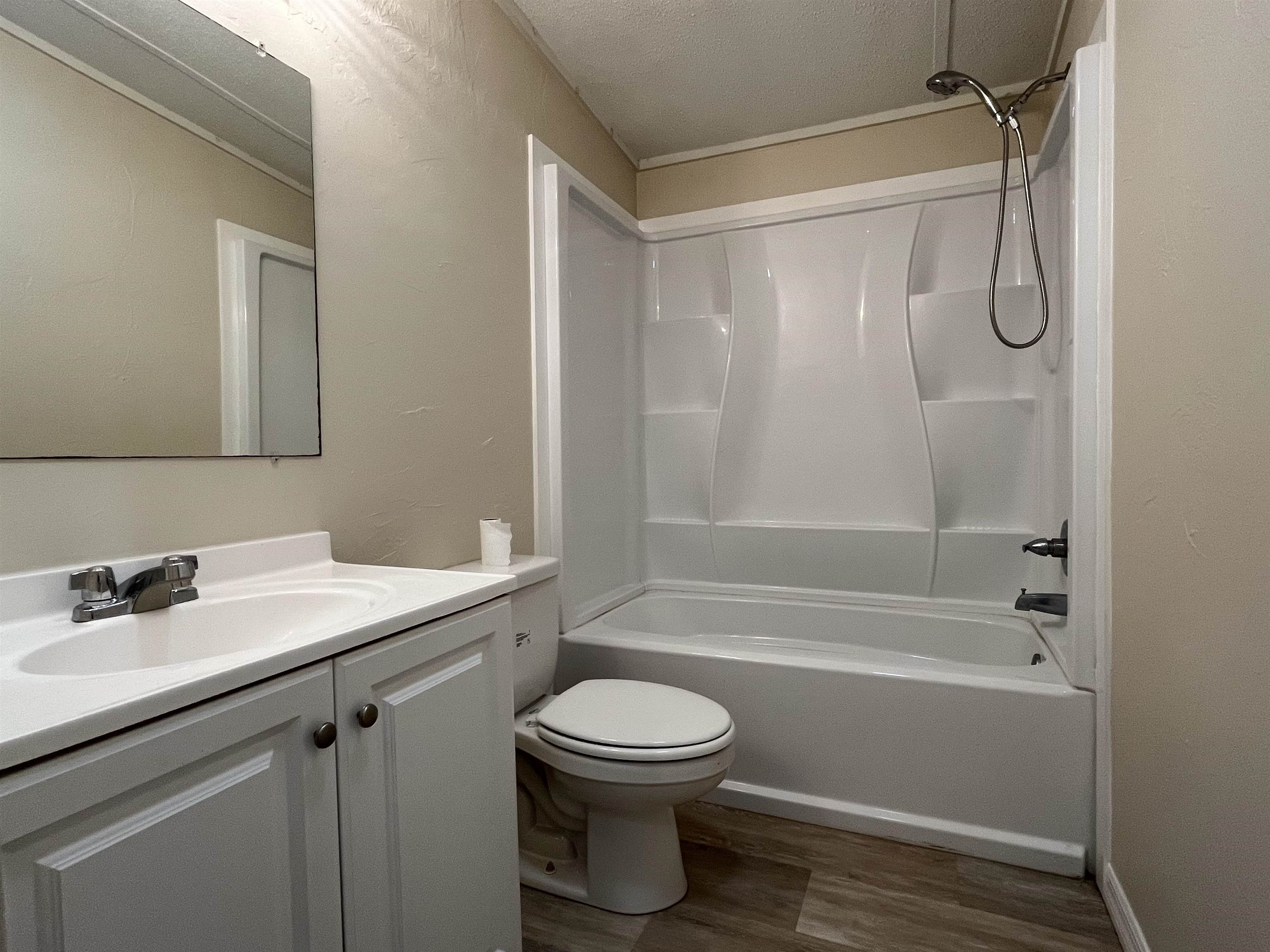 1340 Thompson Bailey Road St. Augustine, FL 32084 - Photo 12 of 21 a bathroom with a sink a toilet and shower