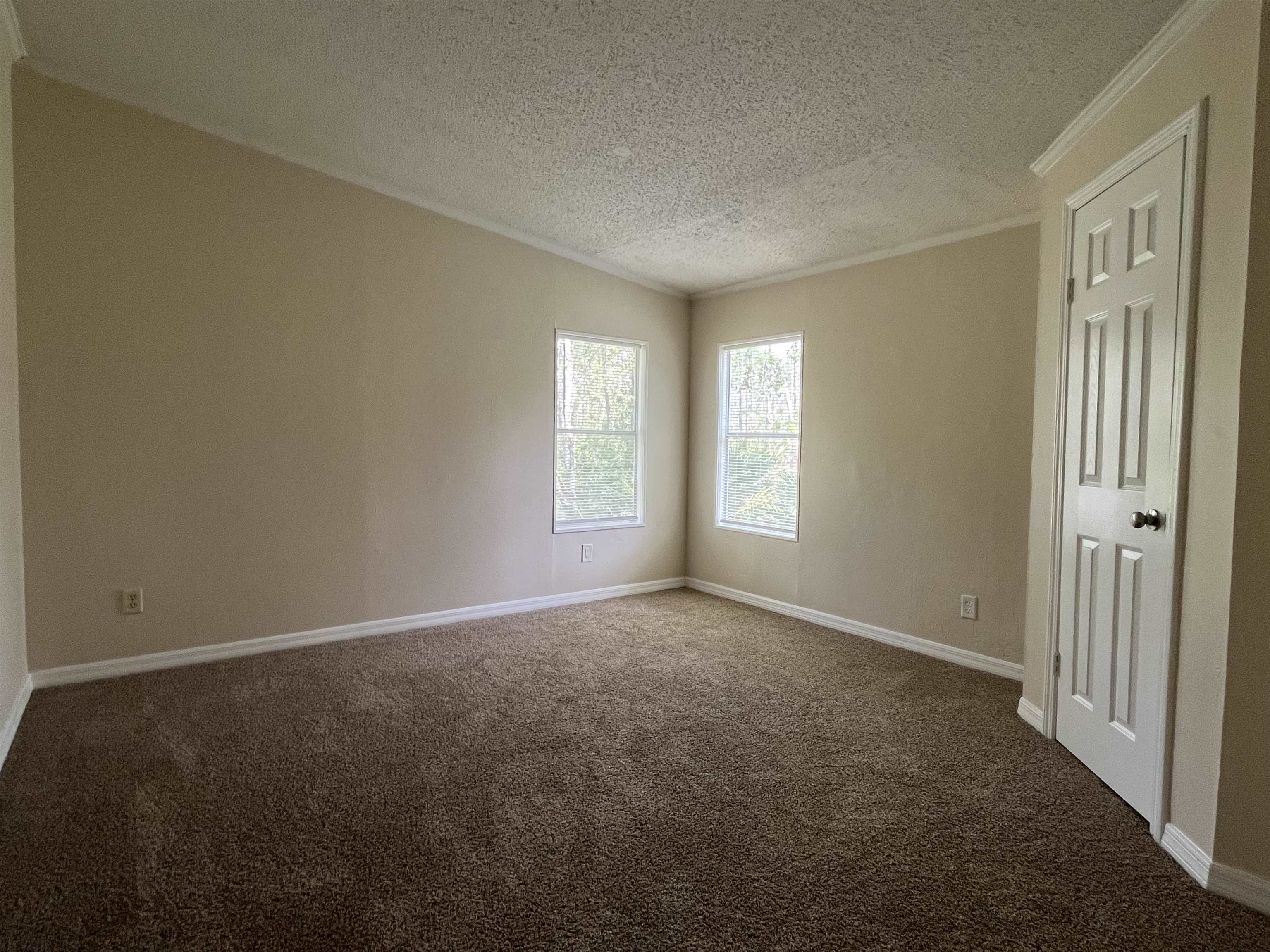 1340 Thompson Bailey Road St. Augustine, FL 32084 - Photo 14 of 21 an empty room with windows