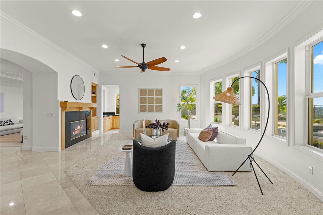 5464 Shannon Ridge Lane San Diego, CA 92130 - Photo 13 of 44 a living room with furniture and a fireplace