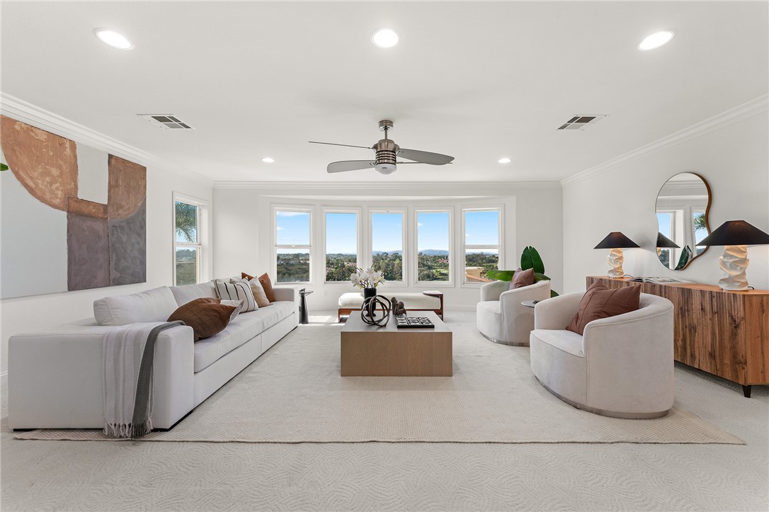 5464 Shannon Ridge Lane San Diego, CA 92130 - Photo 24 of 44 a living room with furniture and a large window