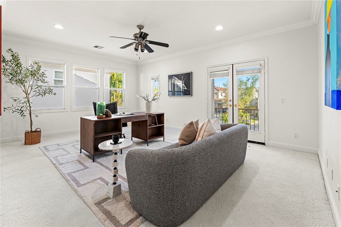 5464 Shannon Ridge Lane San Diego, CA 92130 - Photo 34 of 44 a living room with furniture and a large window