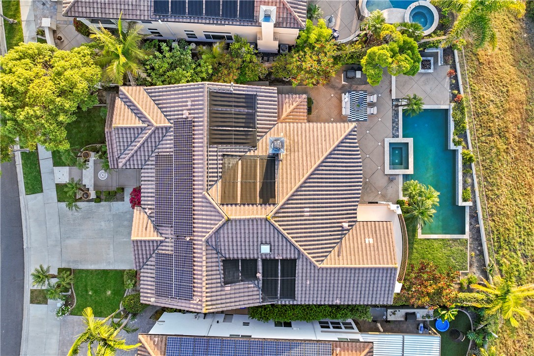 5464 Shannon Ridge Lane San Diego, CA 92130 - Photo 42 of 44 a aerial view of a house with a yard and potted plants