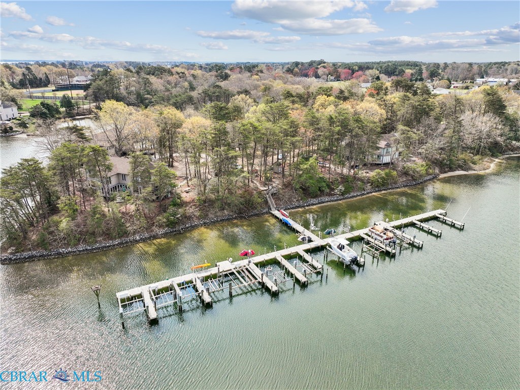 172 Sturgeon Creek Road Deltaville, VA 23043 - Photo 39 of 50 Bird's eye view of a nearby body of water and a tree filled landscape