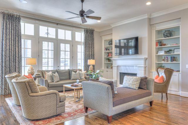a kitchen with sink stove and cabinets
