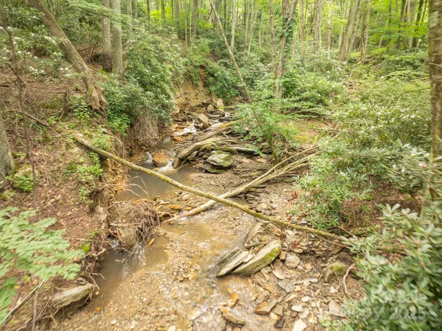 a view of a swimming pool with an outdoor space and seating area