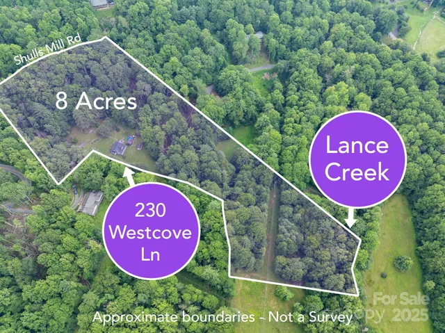 a sign board with a wooden fence