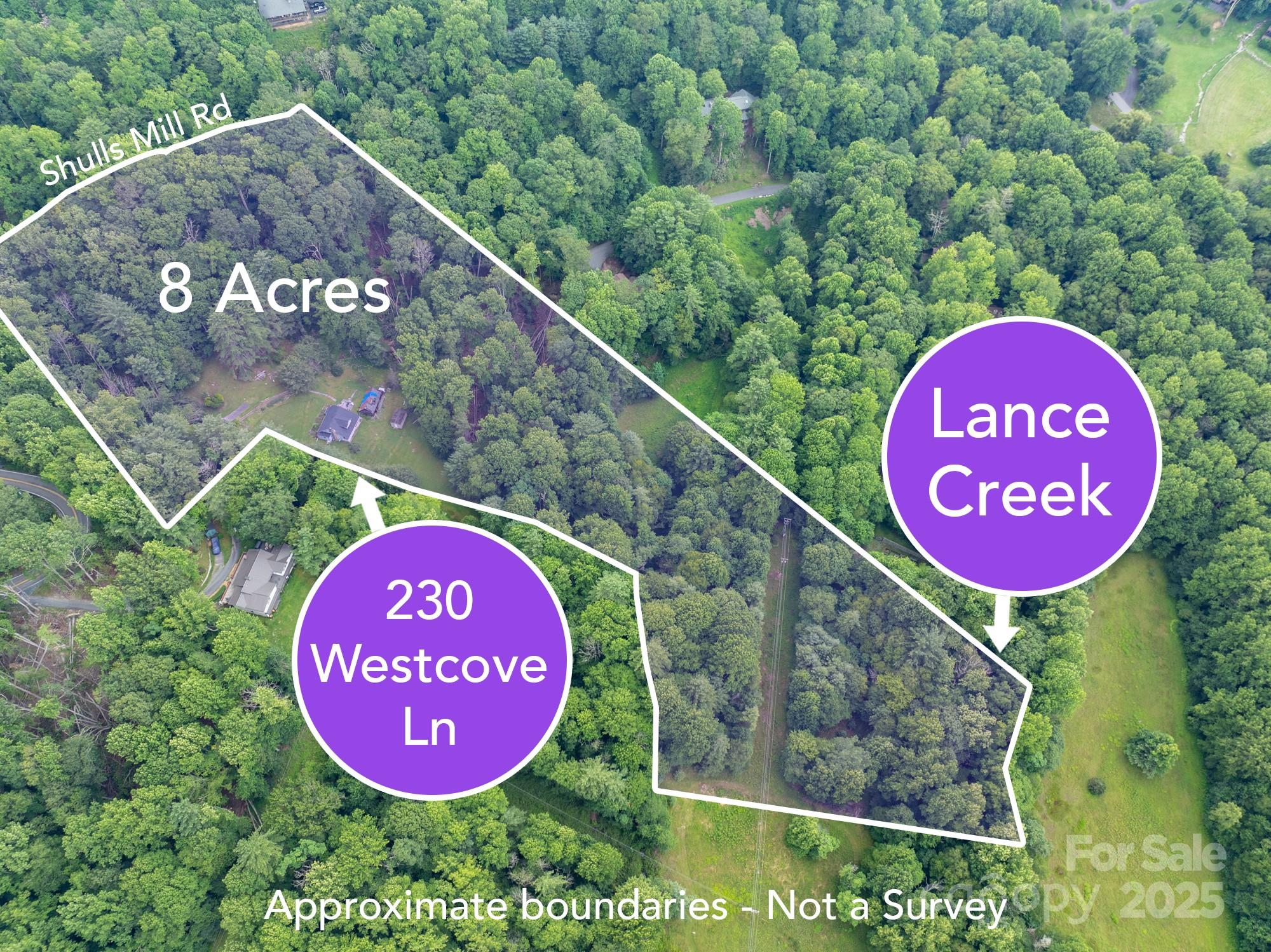 230 West Cove Lane Boone, NC 28607 - Photo 4 of 46 a sign board with a wooden fence