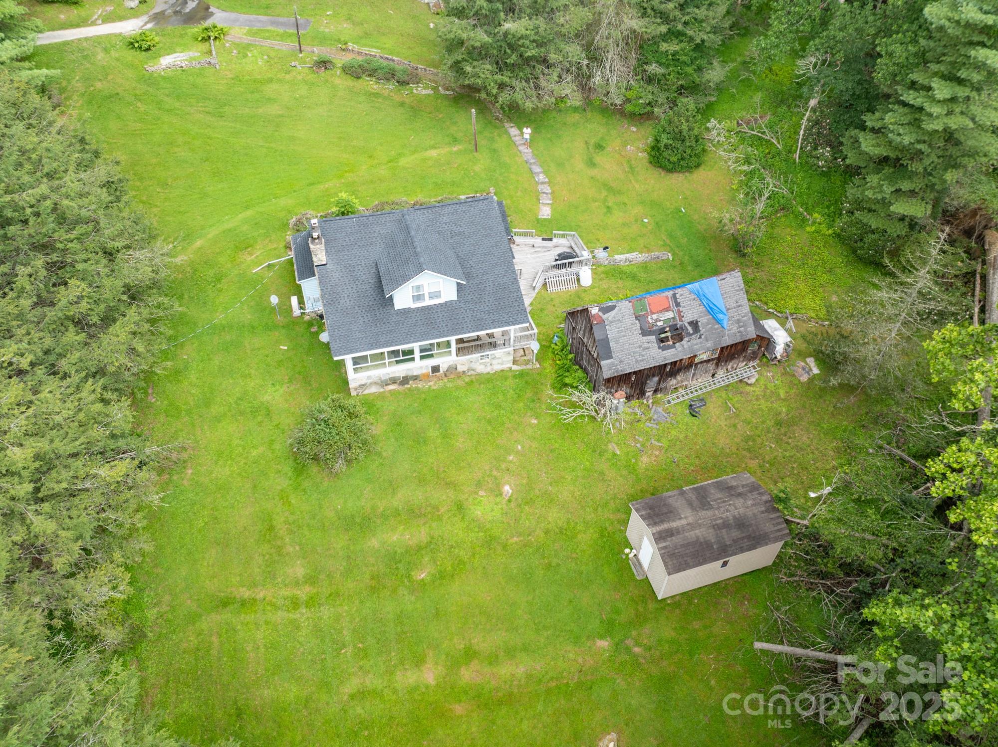 230 West Cove Lane Boone, NC 28607 - Photo 10 of 46 an aerial view of a house with a garden