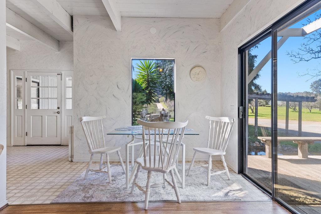 500 Valencia School Road Aptos, CA 95003 - Photo 9 of 44 a view of a dining room with furniture window and wooden floor