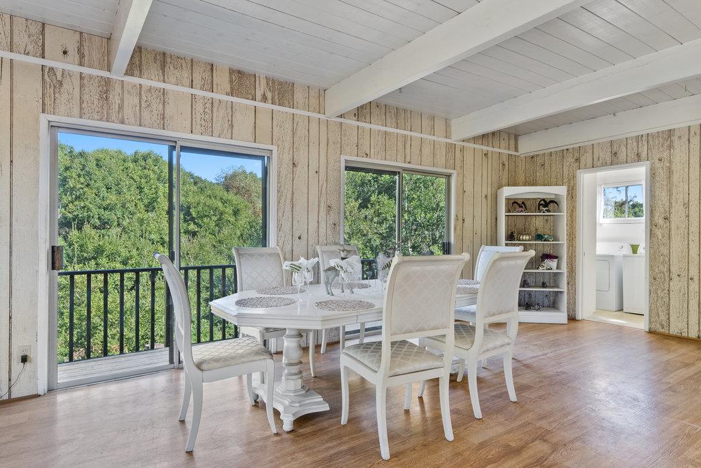 500 Valencia School Road Aptos, CA 95003 - Photo 13 of 44 a view of a dining room with furniture window and wooden floor