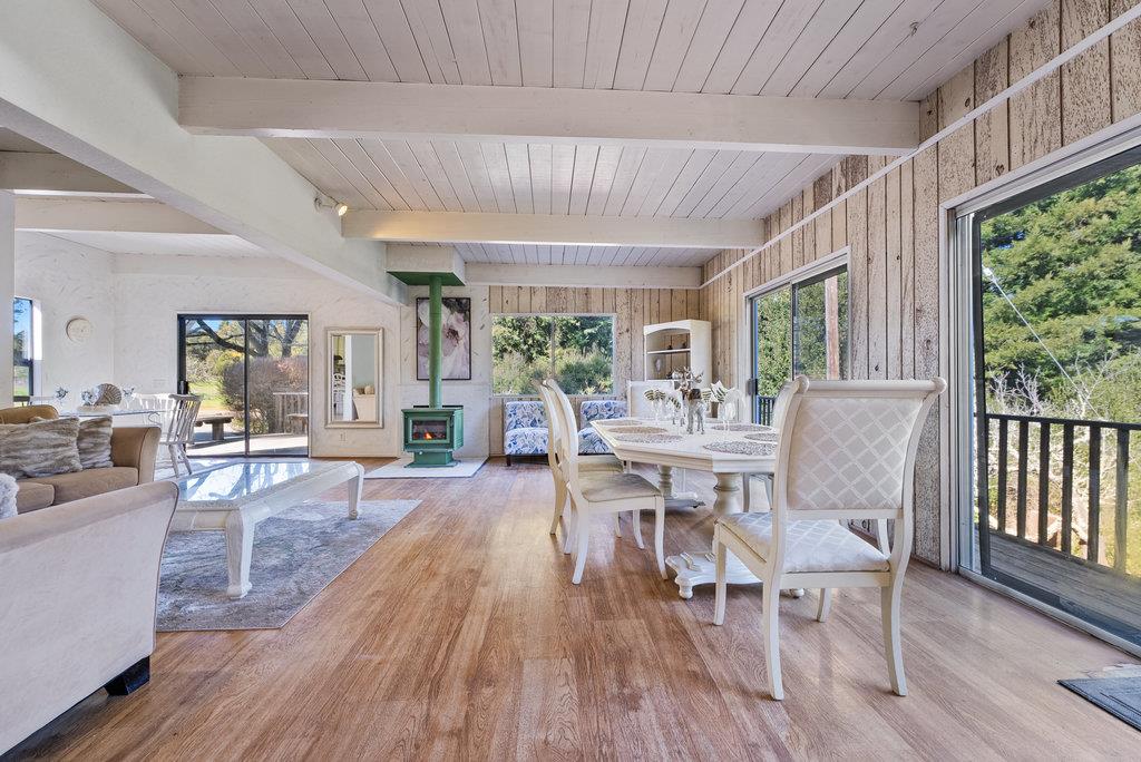 500 Valencia School Road Aptos, CA 95003 - Photo 15 of 44 a view of a dining room with furniture window and wooden floor
