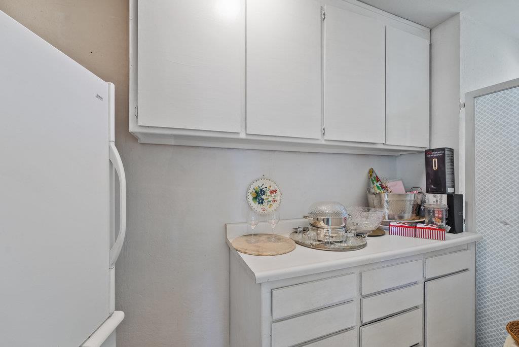 500 Valencia School Road Aptos, CA 95003 - Photo 26 of 44 a kitchen with a sink and cabinets