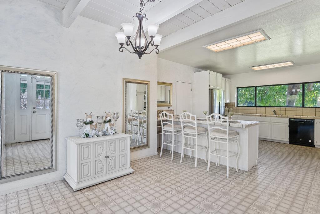 500 Valencia School Road Aptos, CA 95003 - Photo 3 of 44 a view of a dining room with furniture and chandelier