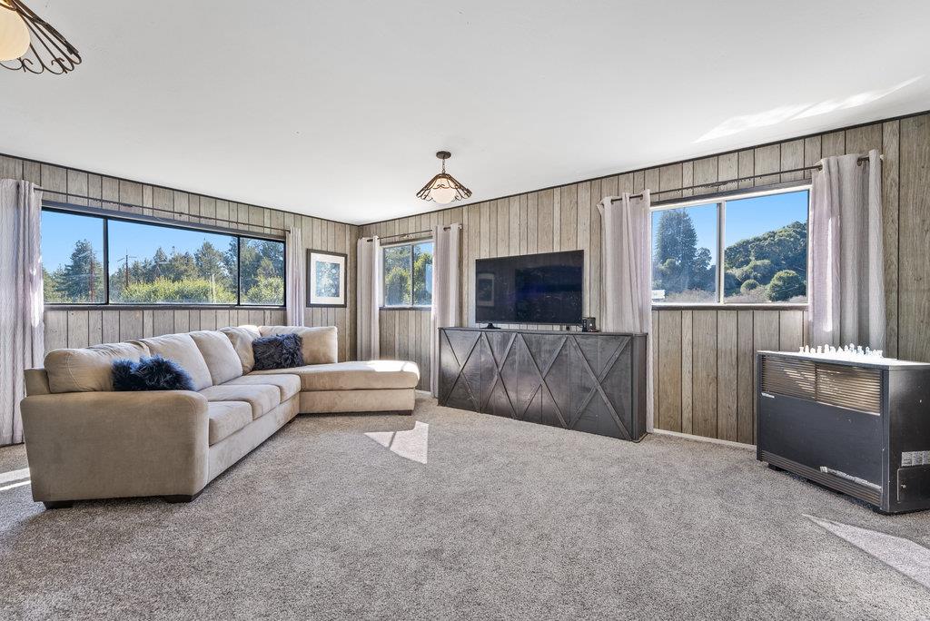 500 Valencia School Road Aptos, CA 95003 - Photo 28 of 44 a living room with furniture and a flat screen tv