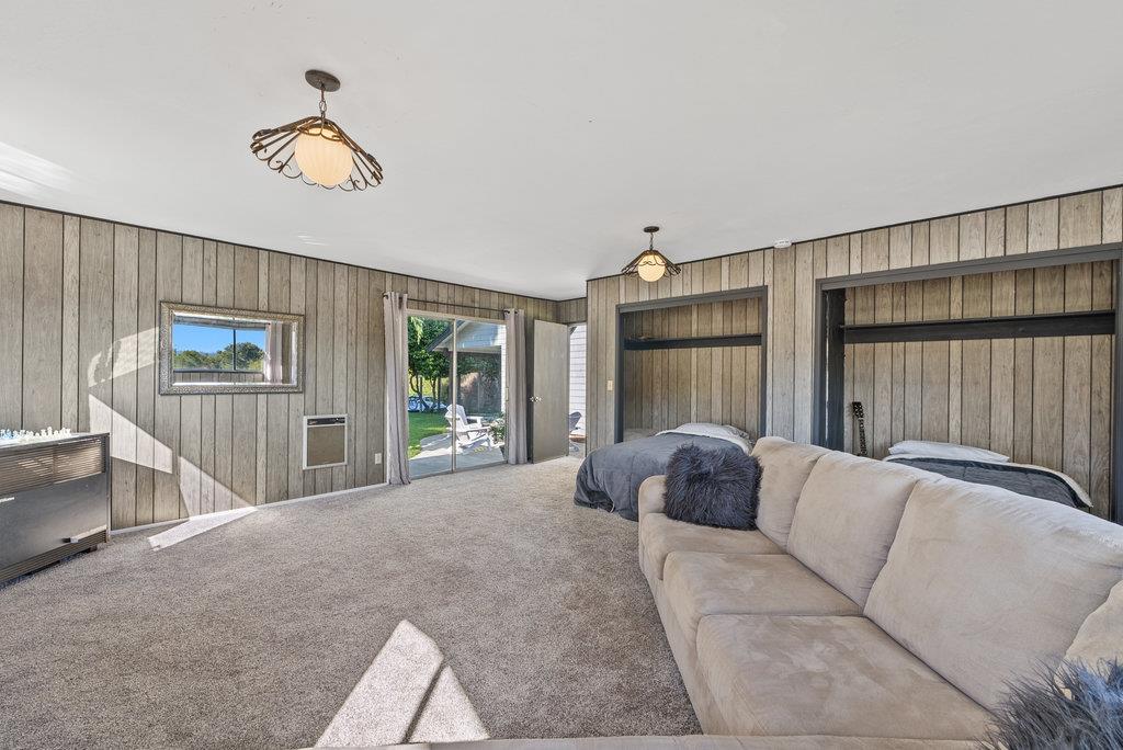 500 Valencia School Road Aptos, CA 95003 - Photo 29 of 44 a living room with furniture and a window