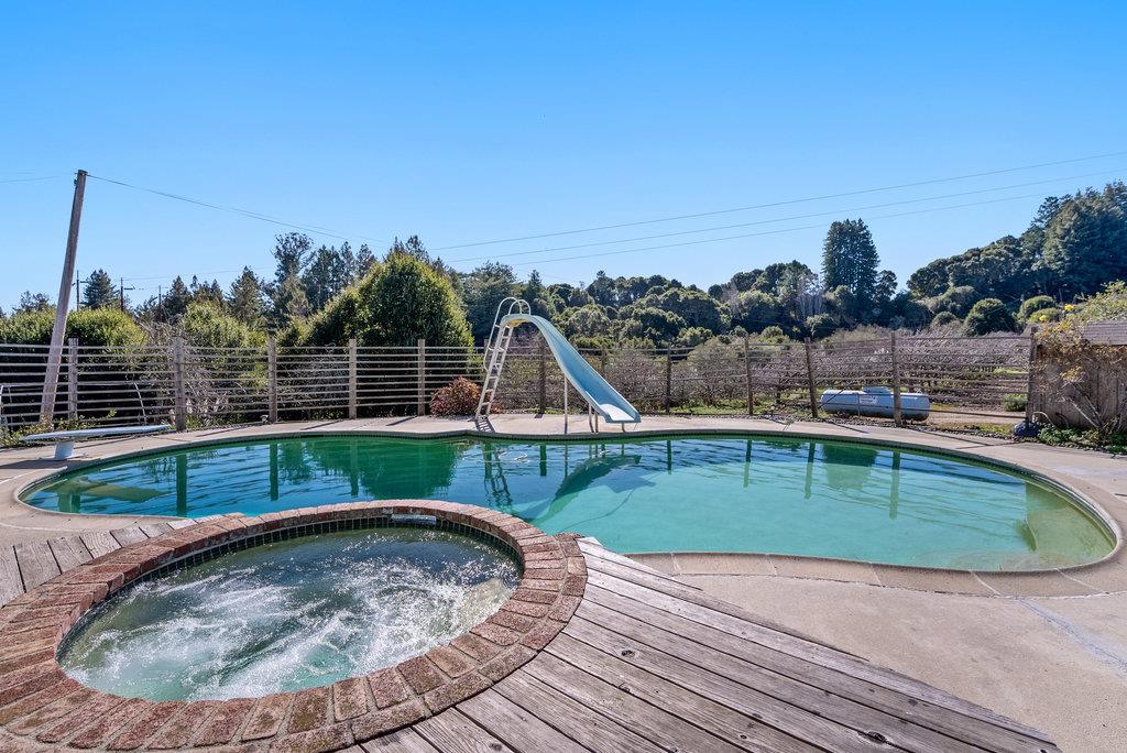 500 Valencia School Road Aptos, CA 95003 - Photo 31 of 44 a view of a swimming pool with a patio
