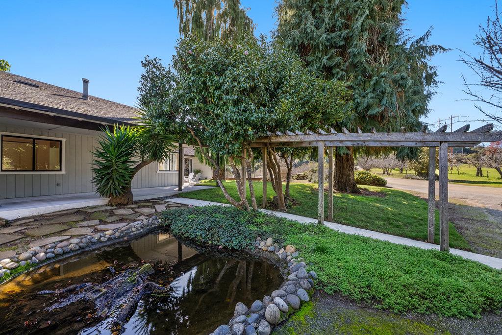 500 Valencia School Road Aptos, CA 95003 - Photo 37 of 44 a view of a house with backyard and sitting area