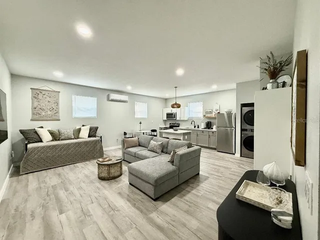 a living room with furniture and a couch