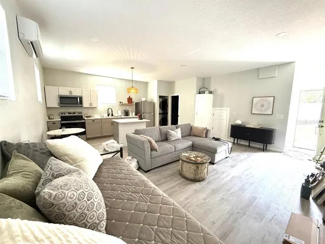 a living room with furniture and a couch