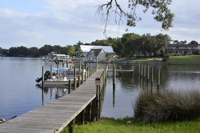a view of a lake with a deck