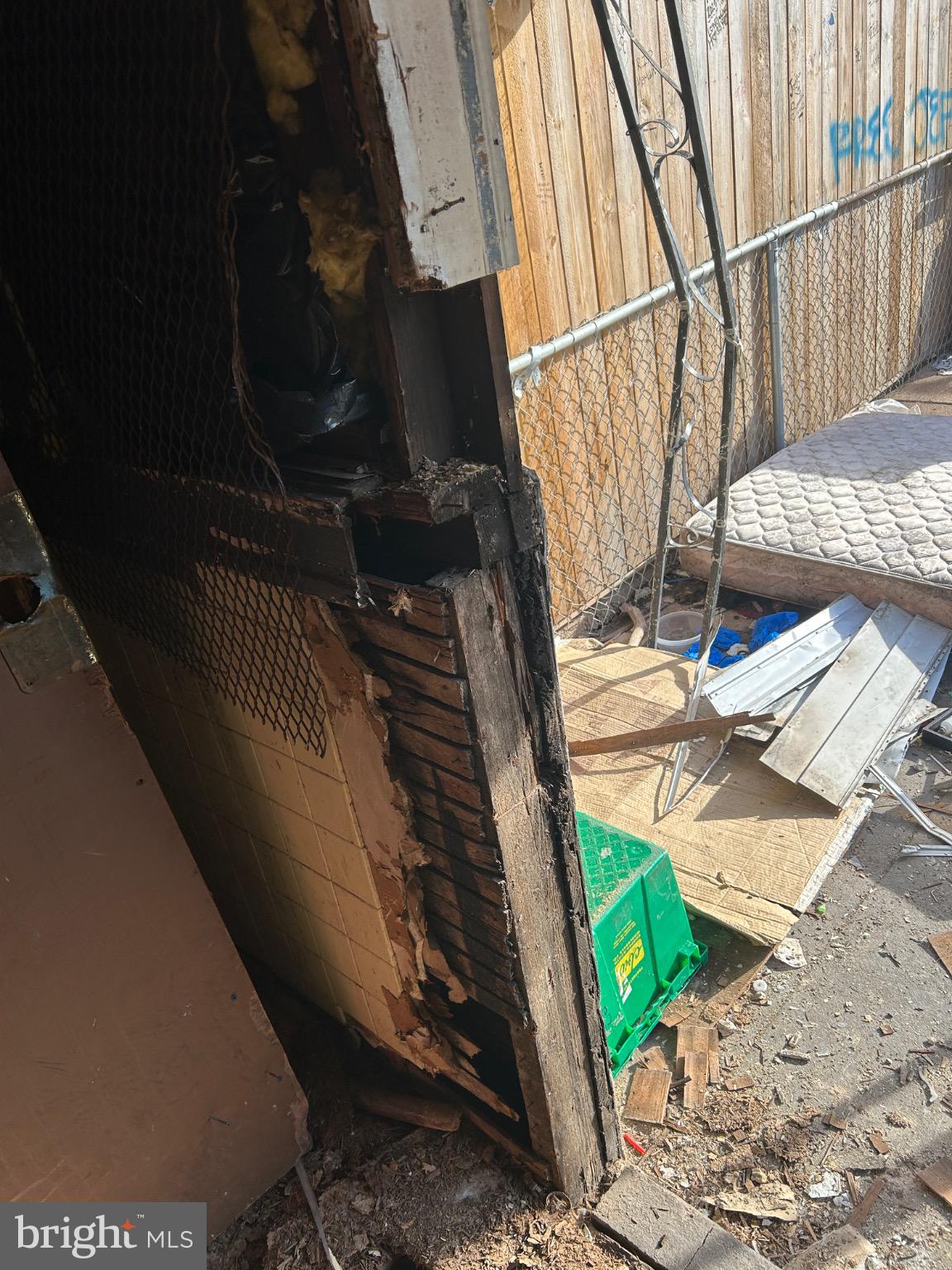 3529 East Fayette Street Baltimore, MD 21224 - Photo 21 of 23 Damaged entryway in need of repair.