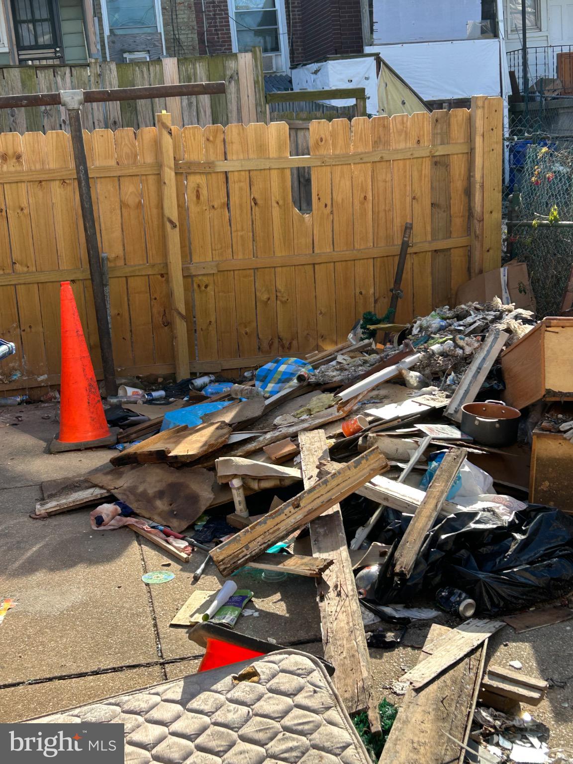 3529 East Fayette Street Baltimore, MD 21224 - Photo 7 of 23 Urban clutter: a neglected outdoor space.