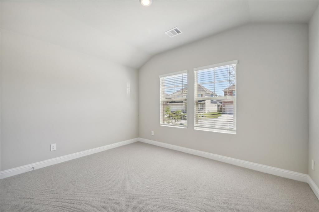 809 Sunflower Road Lavon, TX 75166 - Photo 14 of 32 an empty room with a window