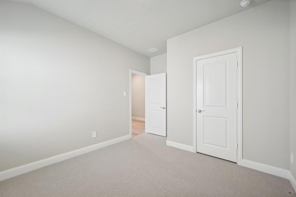 809 Sunflower Road Lavon, TX 75166 - Photo 18 of 32 a view of an empty room
