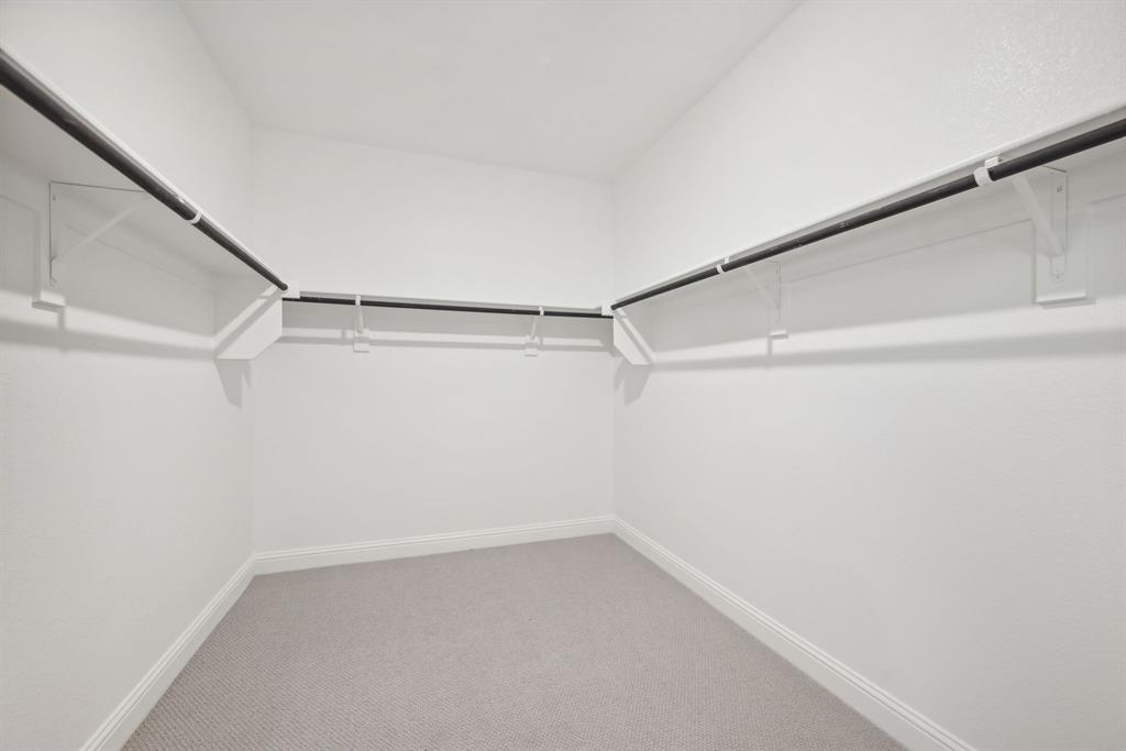 809 Sunflower Road Lavon, TX 75166 - Photo 29 of 32 a view of an empty walk in closet