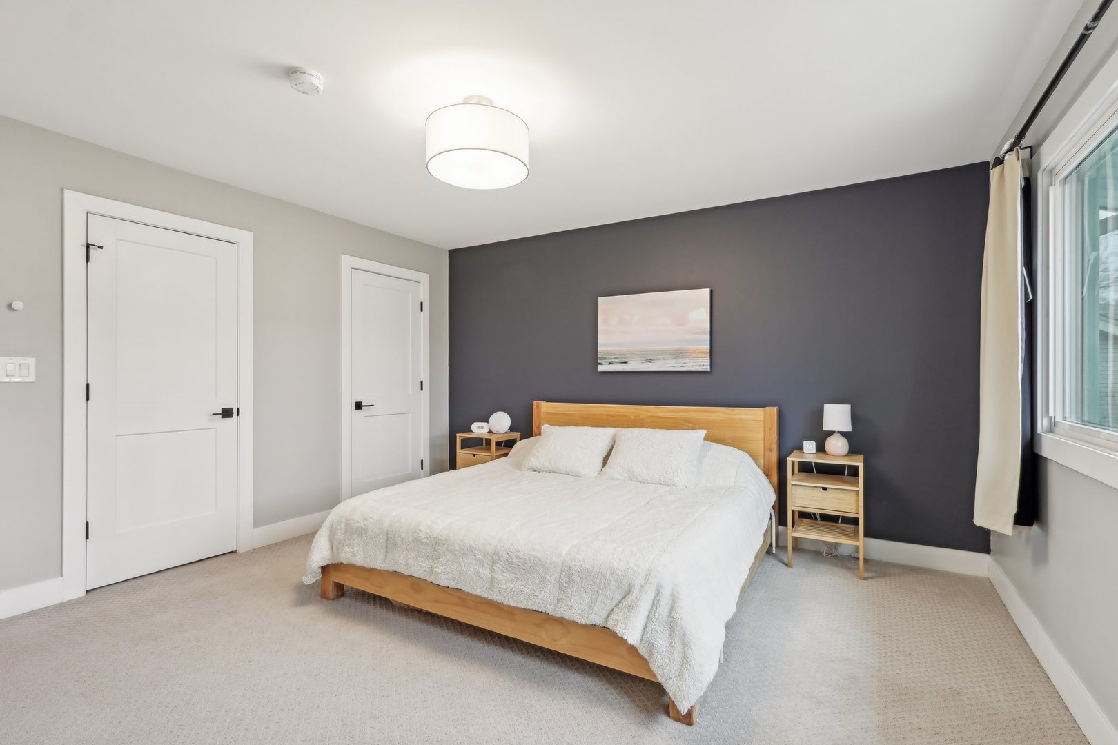 2542 Woodlawn Road Northbrook, IL 60062 - Photo 12 of 38 a bedroom with a bed and a chandelier