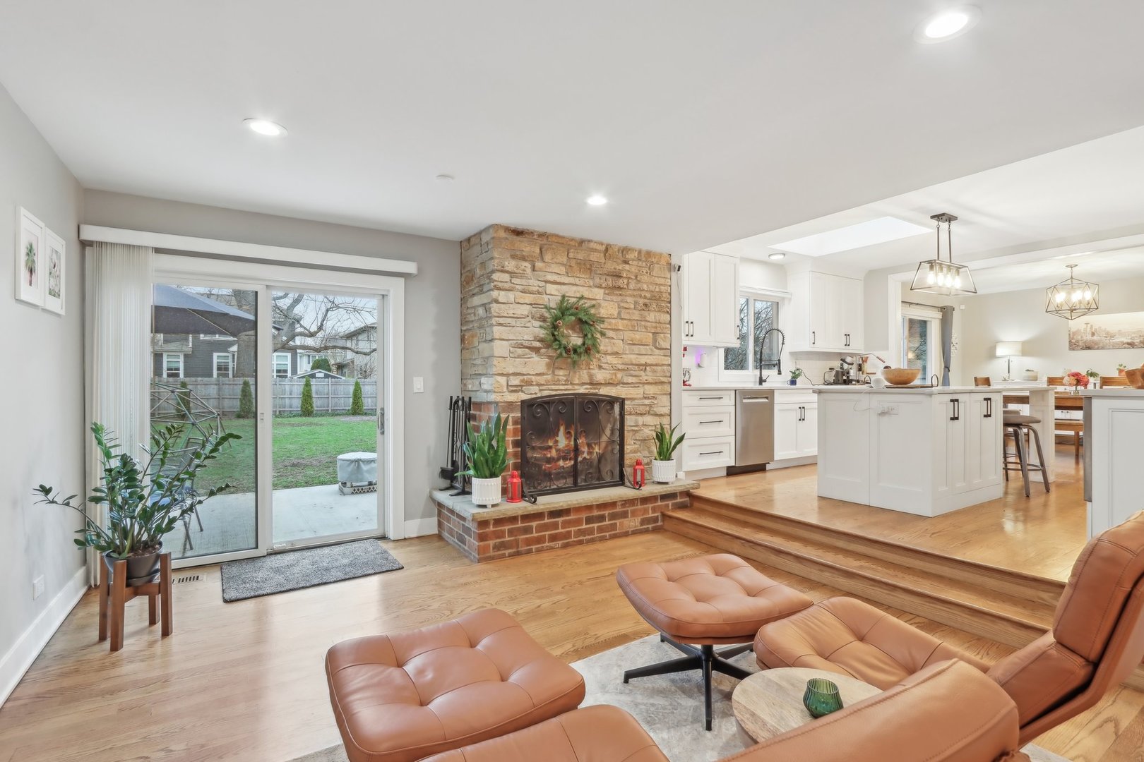 2542 Woodlawn Road Northbrook, IL 60062 - Photo 2 of 38 a living room with furniture and a fireplace