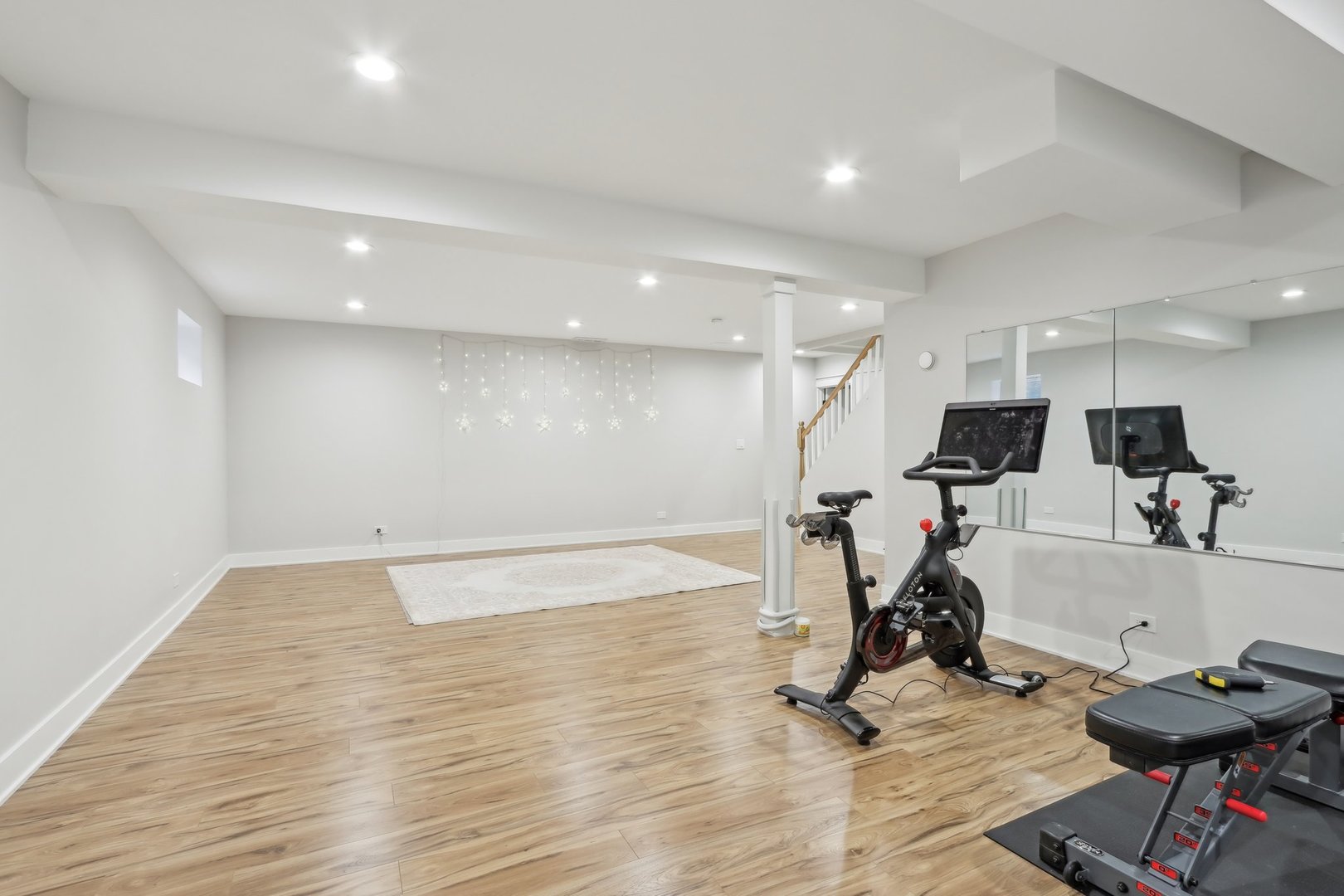 2542 Woodlawn Road Northbrook, IL 60062 - Photo 26 of 38 a view of a room with gym equipment and wooden floor