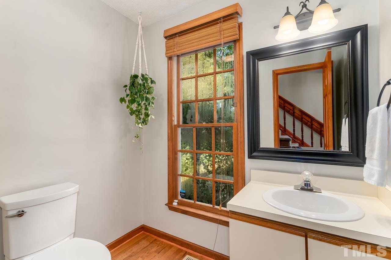 5504 Spring Pines Way Raleigh, NC 27616 - Photo 12 of 25 a bathroom with a sink and a mirror