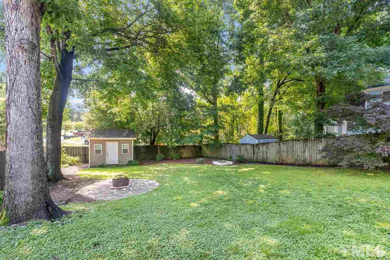 5504 Spring Pines Way Raleigh, NC 27616 - Photo 24 of 25 a view of a house with backyard and sitting area