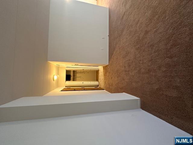 873 Main Street, Unit 2C Hackensack, NJ 07601 - Photo 2 of 19 a view of an empty room and window