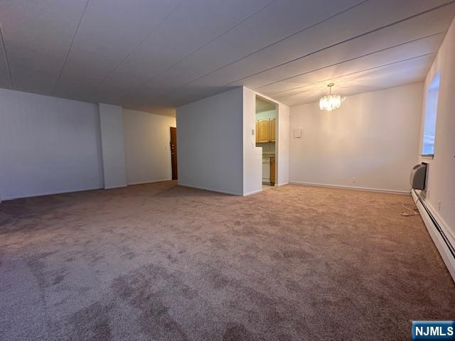 873 Main Street, Unit 2C Hackensack, NJ 07601 - Photo 5 of 19 a view of an empty room with a window