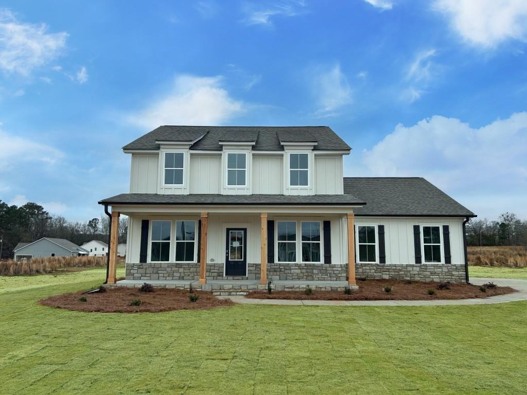 1545 Laboon Road Monroe, GA 30655 - Photo 1 of 1 front view of a house with a yard