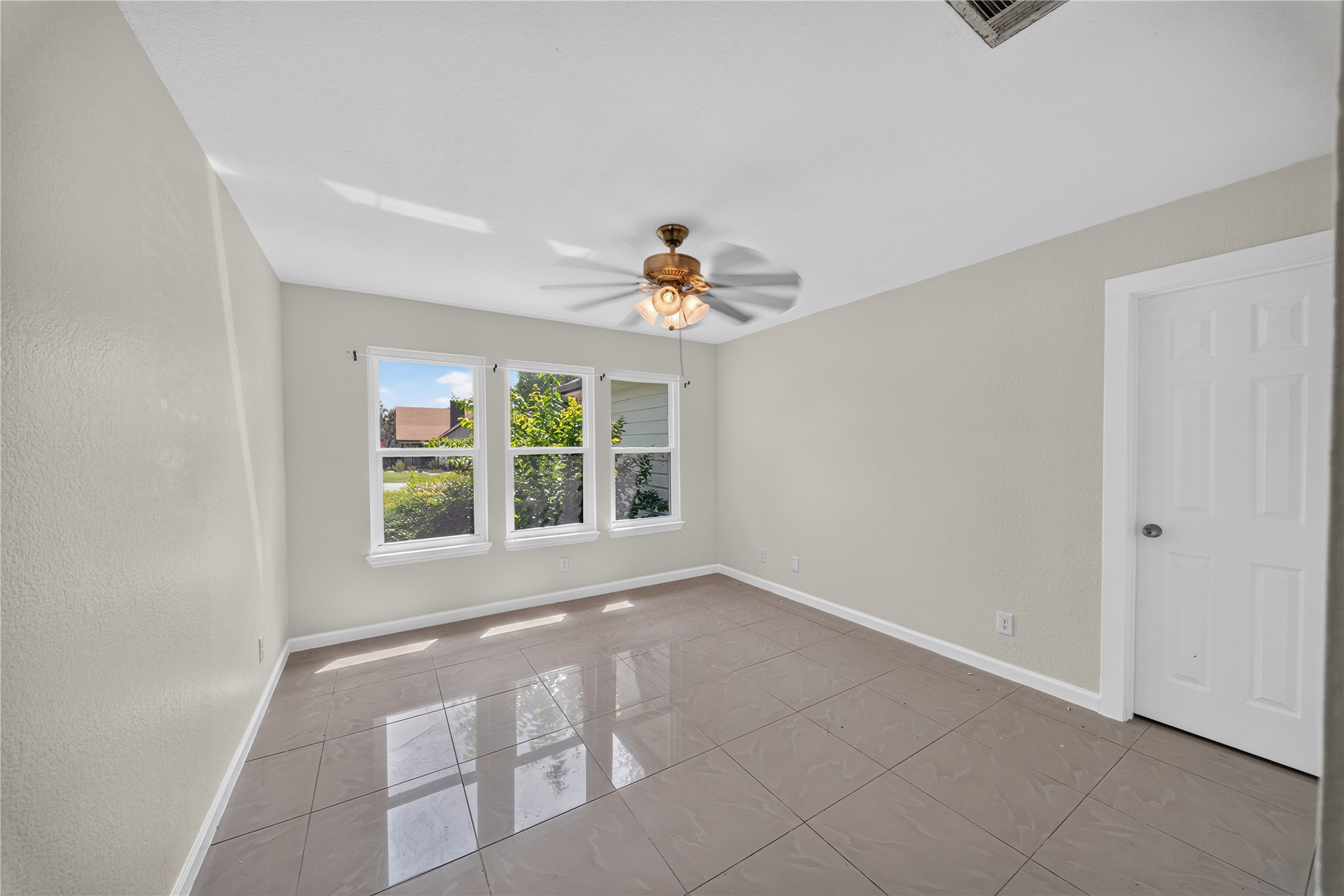 339 Fantail Loop, Unit B Austin, TX 78734 - Photo 16 of 21 a view of an empty room with a window
