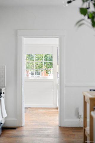 a view of a room that has a window in it