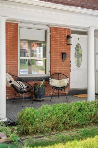 a view of a backyard with table and chairs