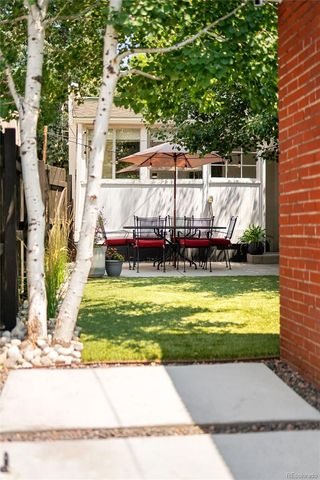 a front view of a house with a swimming pool
