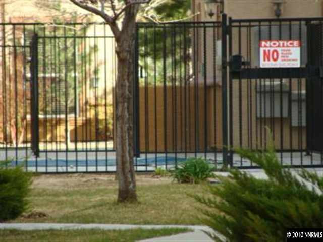 9050 Double R, Unit 922 Reno, NV 89521 - Photo 9 of 9 a view of a garden from a room
