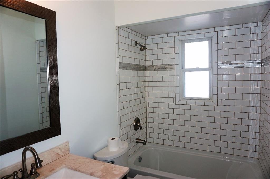 28 Walton Road Pittsburgh, PA 15236 - Photo 17 of 25 Dark Grout and Tile Detail in the Shower is Gorgeous!