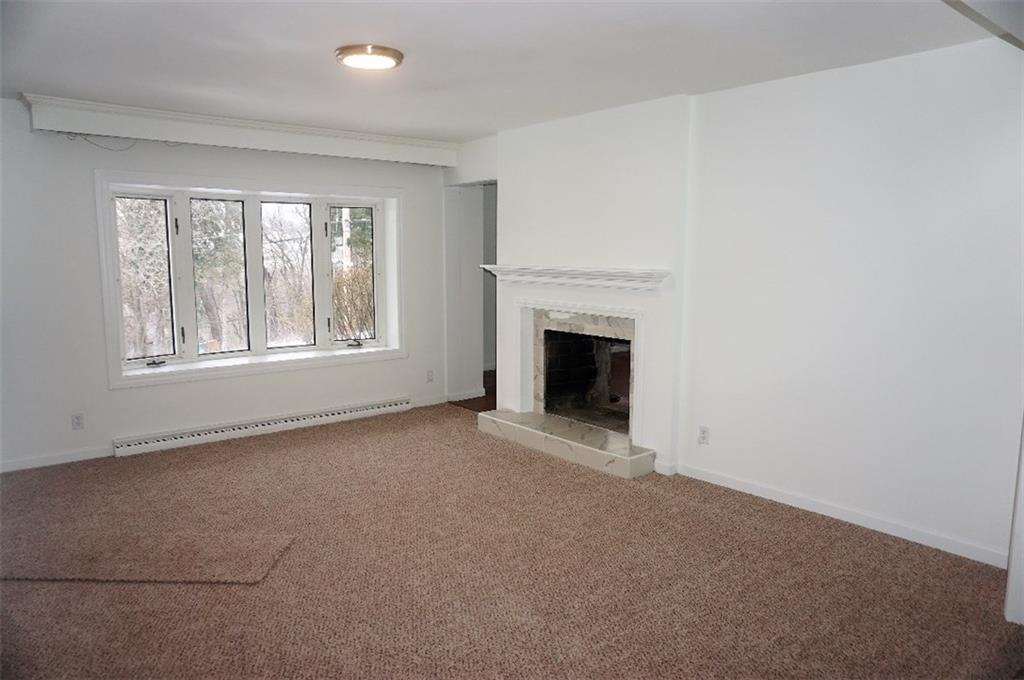 28 Walton Road Pittsburgh, PA 15236 - Photo 4 of 25 Spacious Living Room with Gorgeous Double Sided Fireplace!