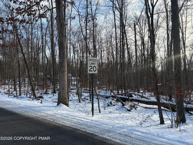 a view of outdoor space with chairs