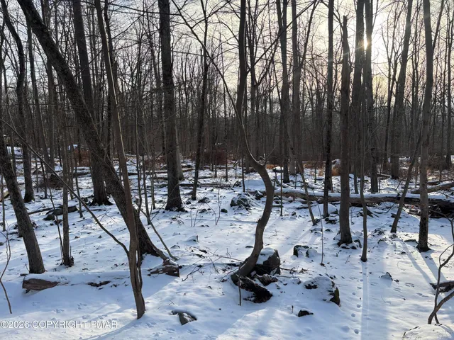 a view of a room with white walls